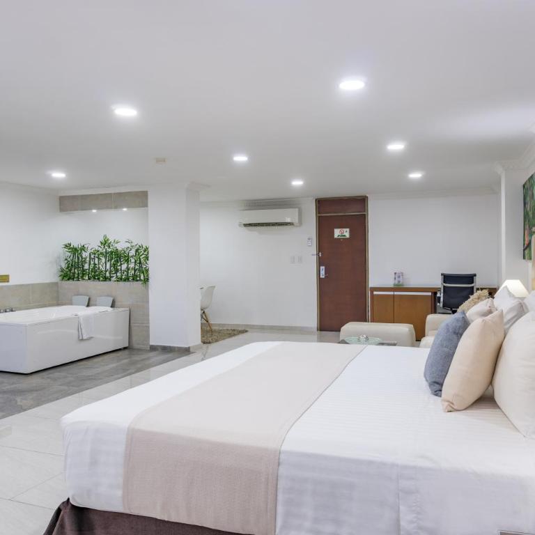 Hotel Caquetá Real HSC - Habitación Doble Deluxe (2 adultos + 1 niño) - 5