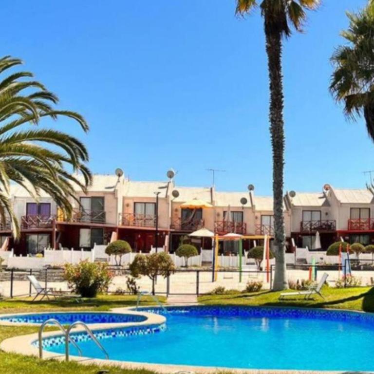 Relajo en condominio, con piscina, parrilla y bicicletas - Three-Bedroom House - 28