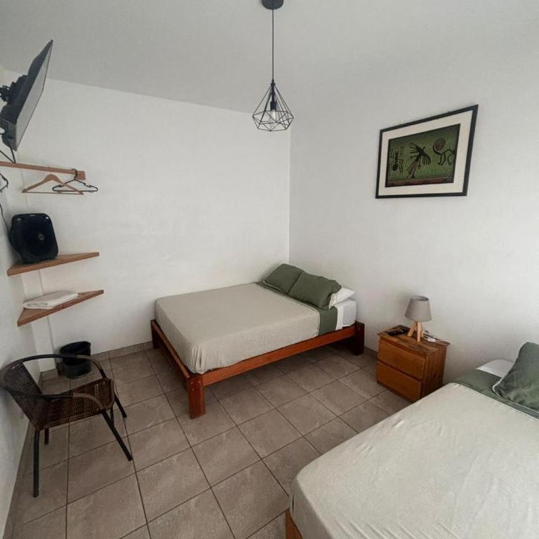 Ravenala Paracas Hostel & Apartment - Habitación Doble - 2 camas - 1