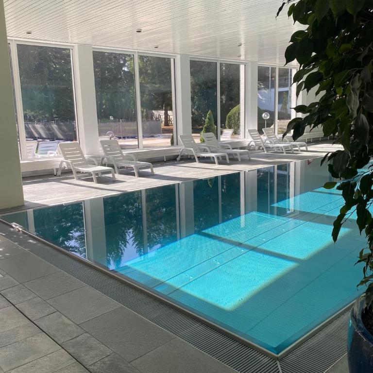 HappyLaax - Elegant Design Studio with Pool, Sauna, and Private Parking - Studio-Apartment mit 1 Doppelbett - 8