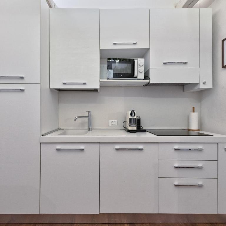 Treviso Centro, Mansarda design con travi a vista - Estudio Superior - 19