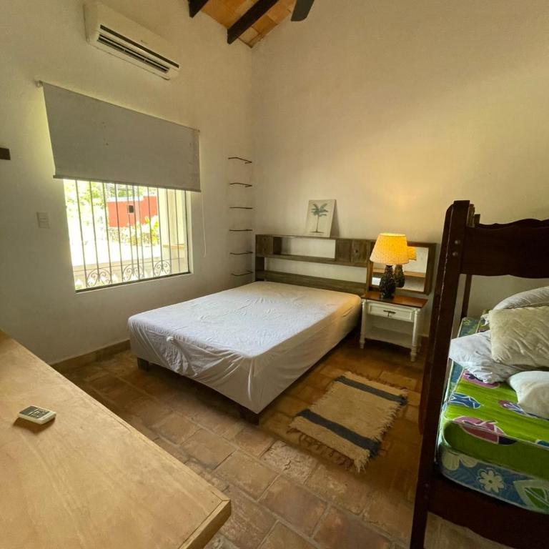Casa colonial a metros del arroyo Piribebuy - Four-Bedroom House - 13