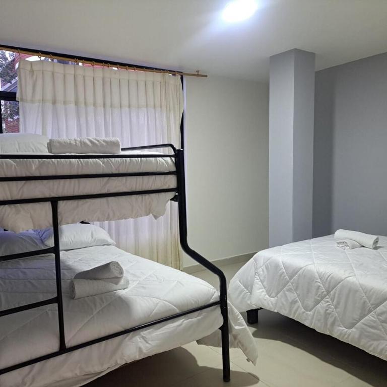 Apartment with pool, social area, garage - Two-Bedroom Apartment with Mountain View - 13