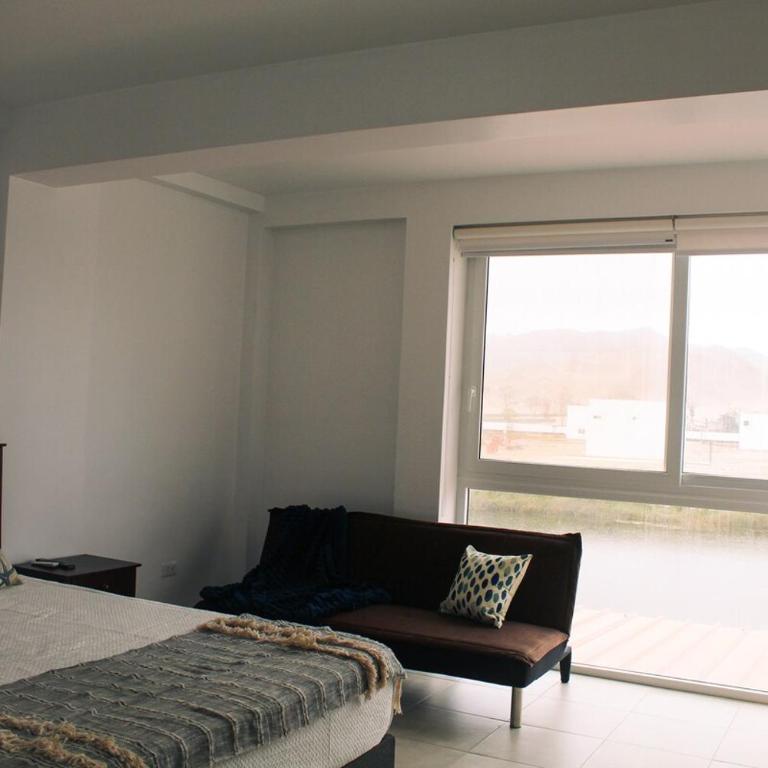 Increible casa de playa con vista al lago - Three-Bedroom House - 17