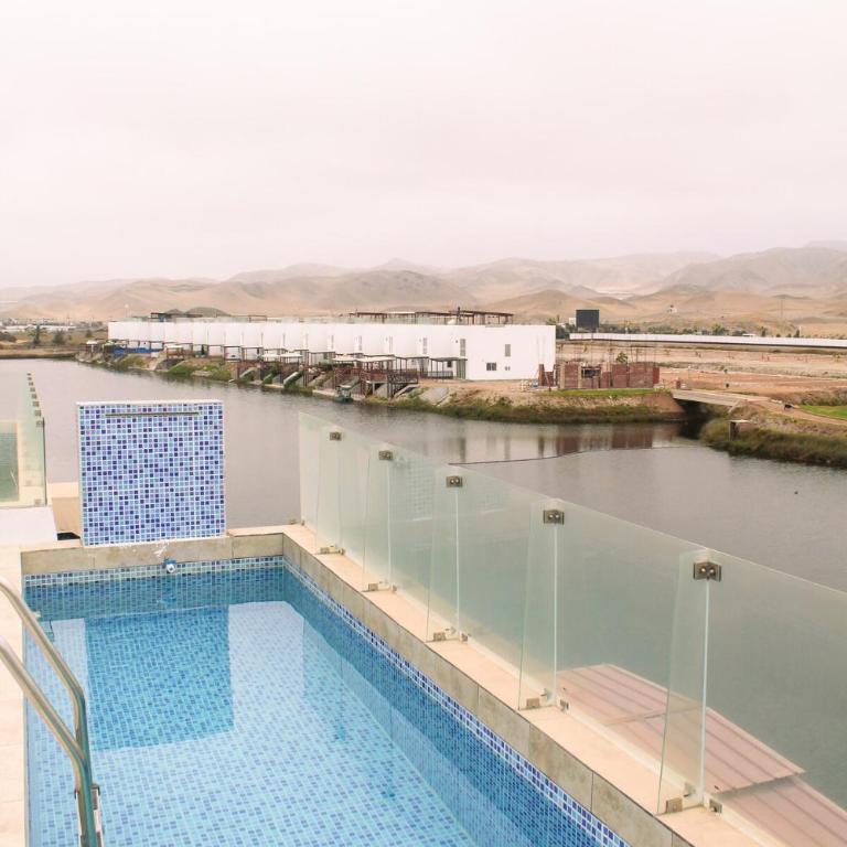 Increible casa de playa con vista al lago - Three-Bedroom House - 22