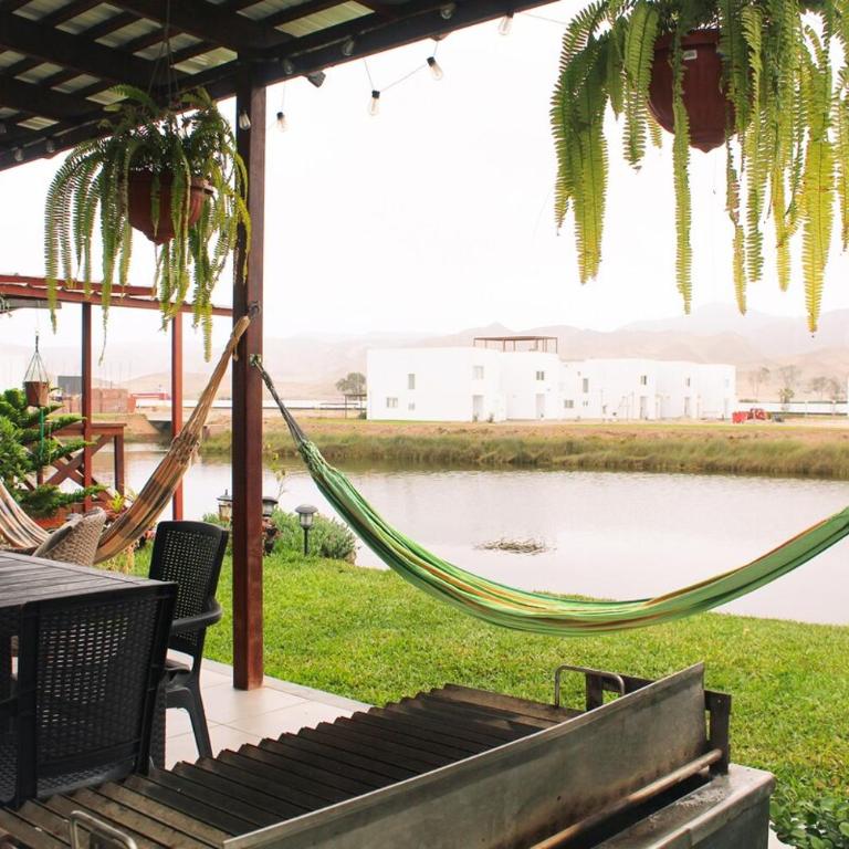Increible casa de playa con vista al lago - Three-Bedroom House - 33