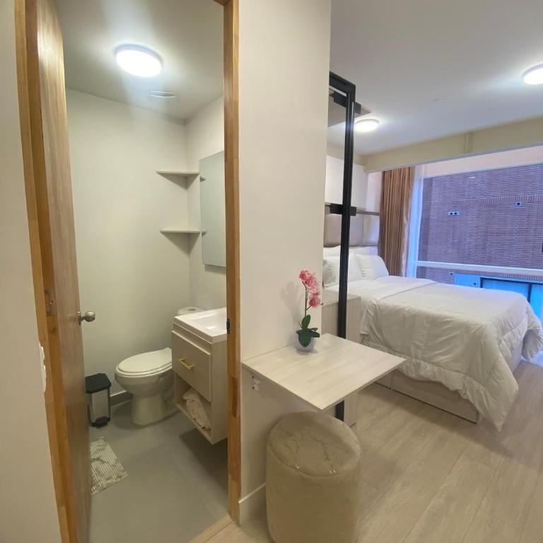 Elegant 1-Bedroom Apartment with Coworking Space - Apartamento de 1 dormitorio - 18