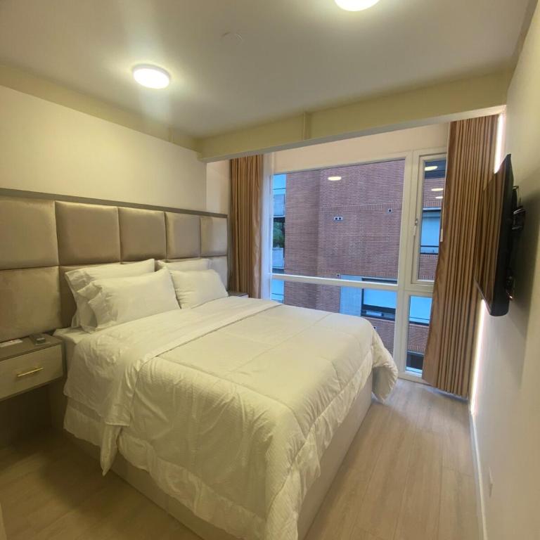 Elegant 1-Bedroom Apartment with Coworking Space - Apartamento de 1 dormitorio - 13