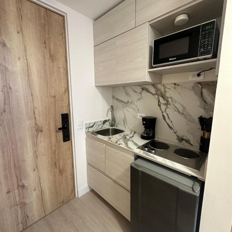 Elegant 1-Bedroom Apartment with Coworking Space - Apartamento de 1 dormitorio - 36