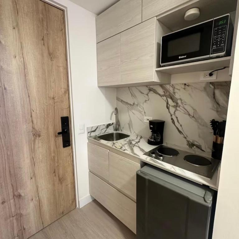 Elegant 1-Bedroom Apartment with Coworking Space - Apartamento de 1 dormitorio - 24