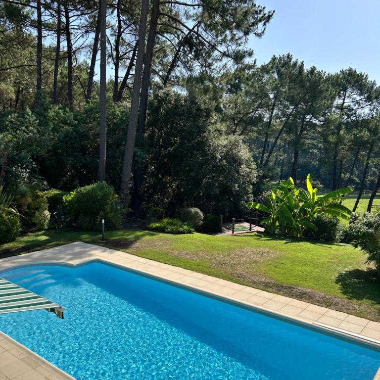 Villa Luxe piscine chauffée, 4 chambres, surplombant le golf entre océan & lac Plage à 5 min - Villa - 21