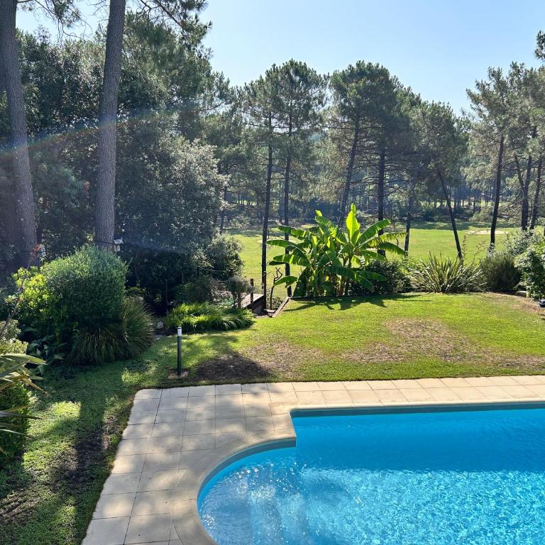 Villa Luxe piscine chauffée, 4 chambres, surplombant le golf entre océan & lac Plage à 5 min - Villa - 25