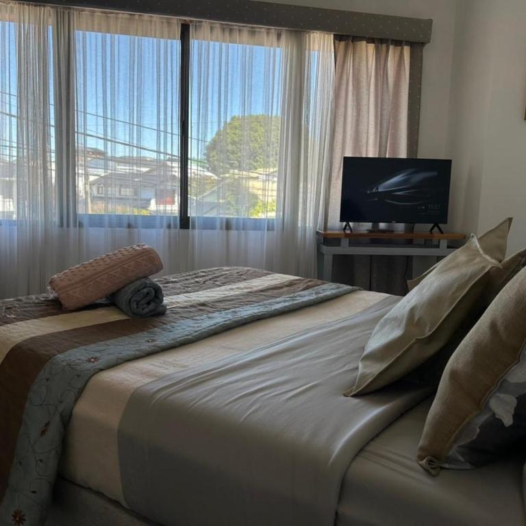 Vistas soñadas, centro, calido, ubicacion ideal - Two-Bedroom Deluxe Apartment - 19