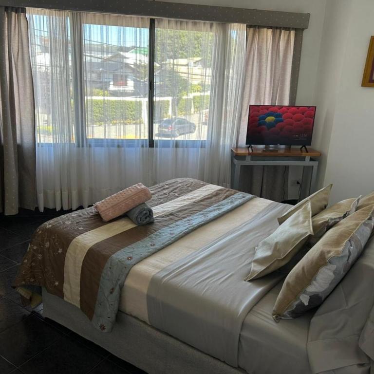 Vistas soñadas, centro, calido, ubicacion ideal - Two-Bedroom Deluxe Apartment - 16