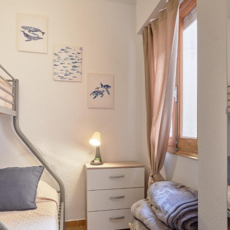 Sunny Coastal Retreat with Pool & Terrace - Two-Bedroom Apartment - 5