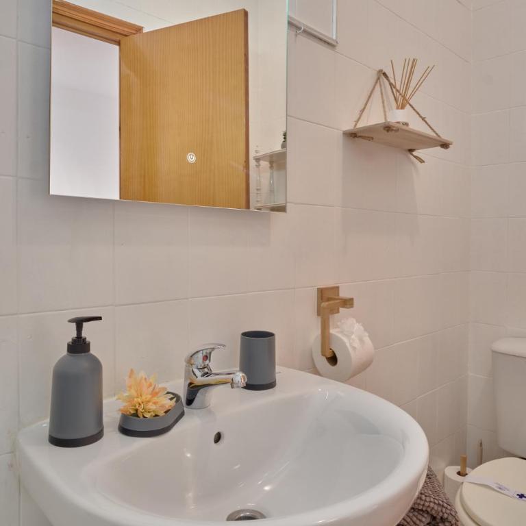 Sunny Coastal Retreat with Pool & Terrace - Two-Bedroom Apartment - 34