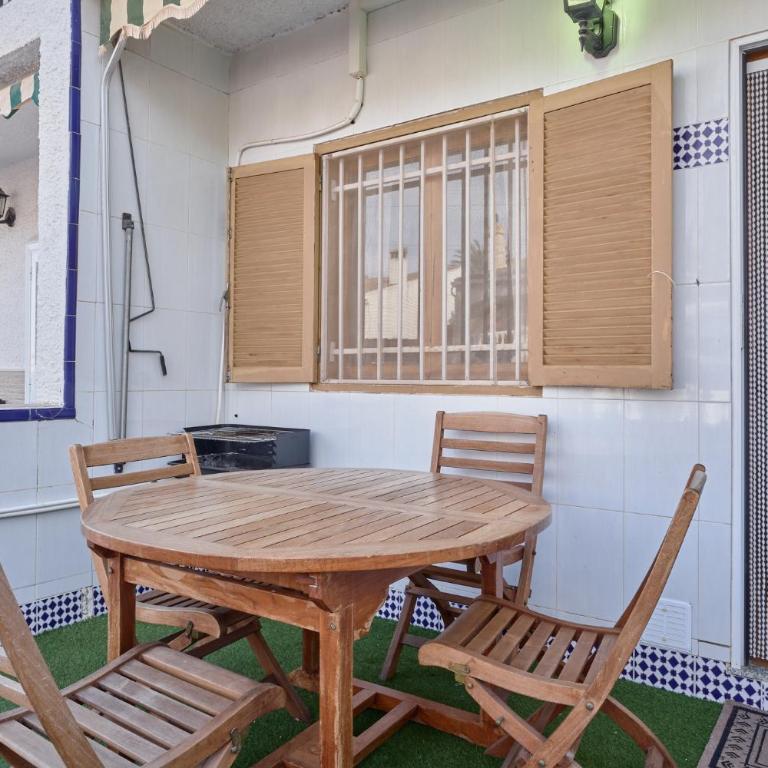 Sunny Coastal Retreat with Pool & Terrace - Two-Bedroom Apartment - 20