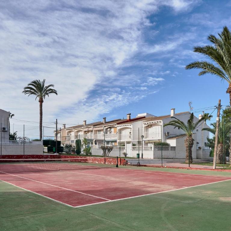 Sunny Coastal Retreat with Pool & Terrace - Two-Bedroom Apartment - 16