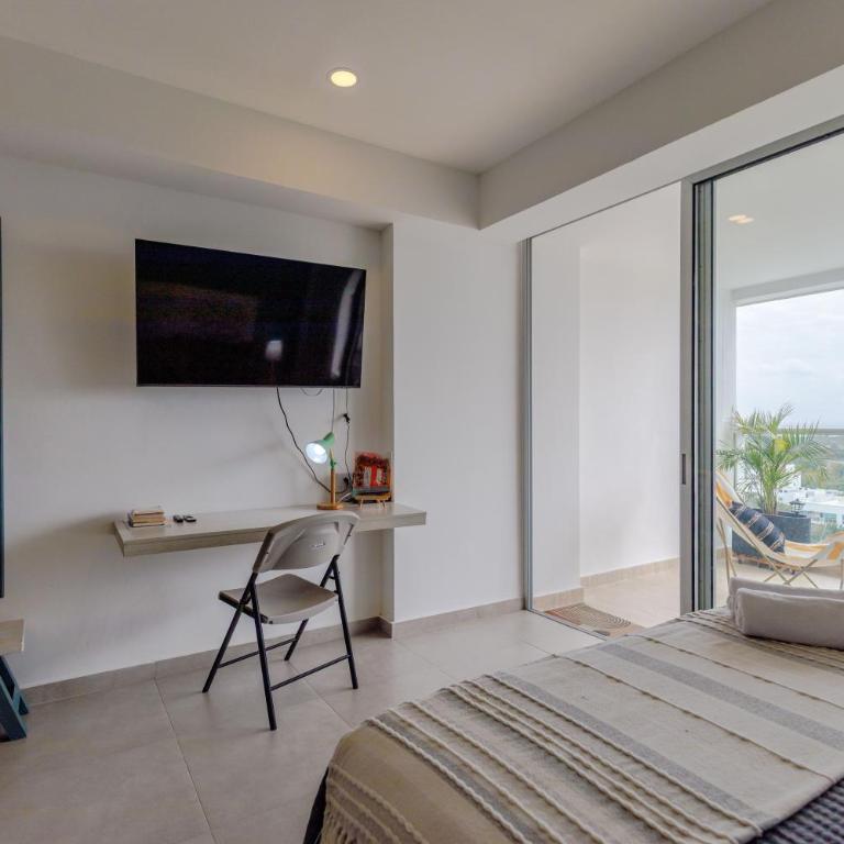 Encantador y moderno estudio con piscina a pasos del aeropuerto - Two-Bedroom Apartment - 89