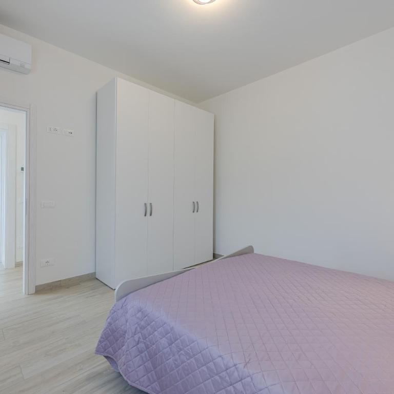 Santa Croce Apartments - Garden - Two-Bedroom Apartment with Lake View - 17