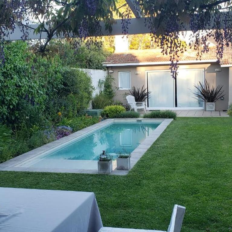 Check and Home - Casa Pellegrini - 8 Huéspedes - Four-Bedroom House - 1