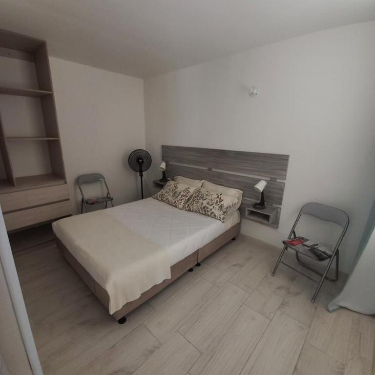 Reserva del Peñón Girardot - Apartamento Vacacional Familiar Confort La Esmeralda - Two-Bedroom Apartment - 4