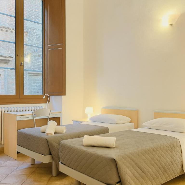 HostelCiompi - Camera Tripla con Bagno Privato - 2