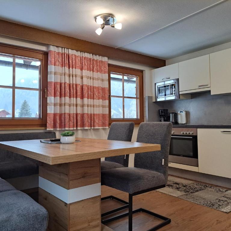 Gästeheim Pötscher - Apartment mit 2 Schlafzimmern und Balkon - 7