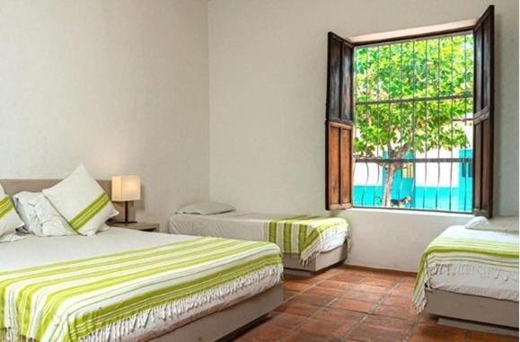 Hotel San German - Habitación Cuádruple Confort - 1