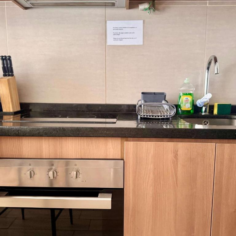 Comodo con aire acondicionado y estacionamiento - Apartment - 14
