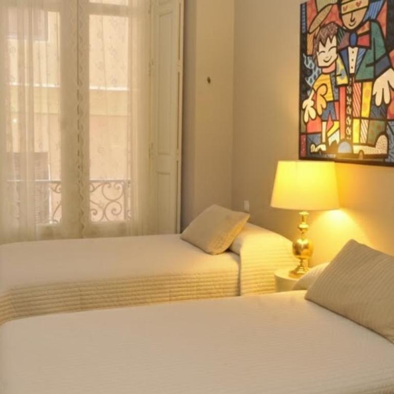 Historic 19th-Century Apartment with Balcony Overlooking Plaza - Deluxe Apartment - 17