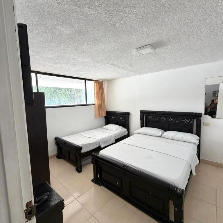Apartamento Rodadero Sunset Edificio Palanoa Frente al mar - Habitación Familiar con baño privado - 7