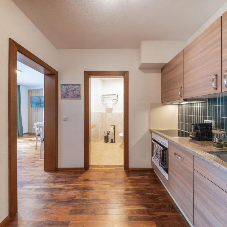 Apartment Alpenweiss - Apartment mit 1 Schlafzimmer und Garten - 11