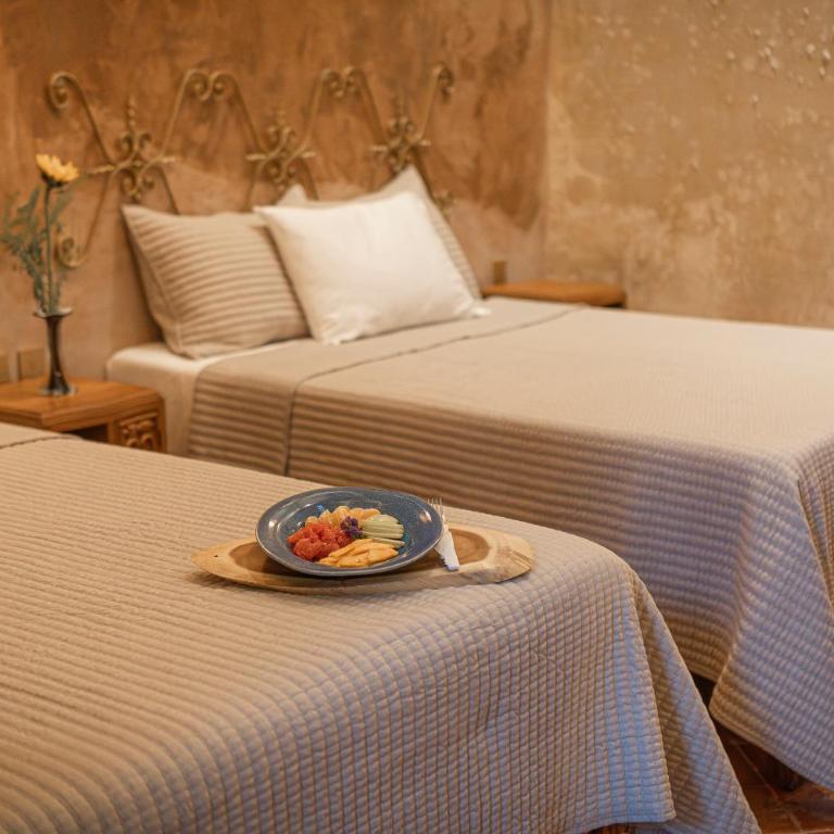 Cien Sueños Hotel Boutique - Deluxe Queen Room with Two Queen Beds - 1