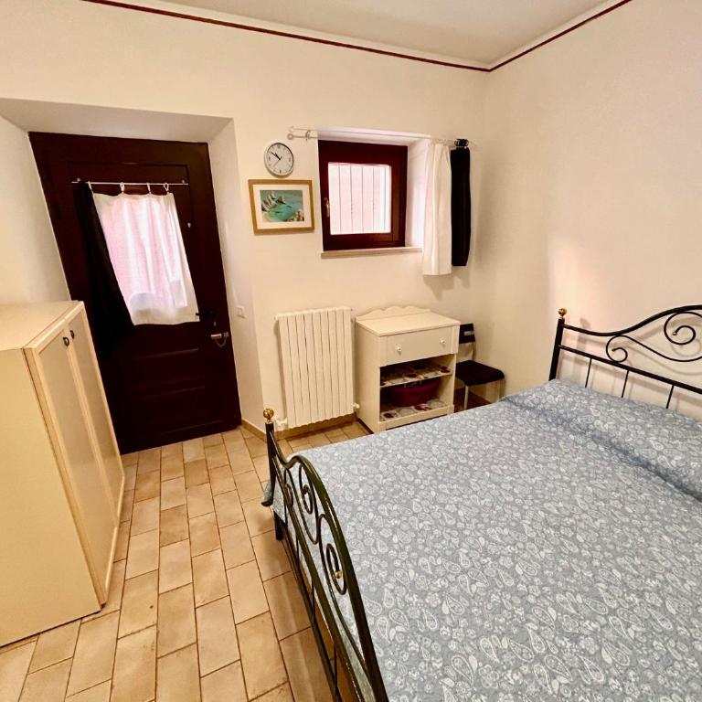 LA CASA DI ANGELO IN CENTRO a piano terra con aria condizionata - One-Bedroom Apartment - 17