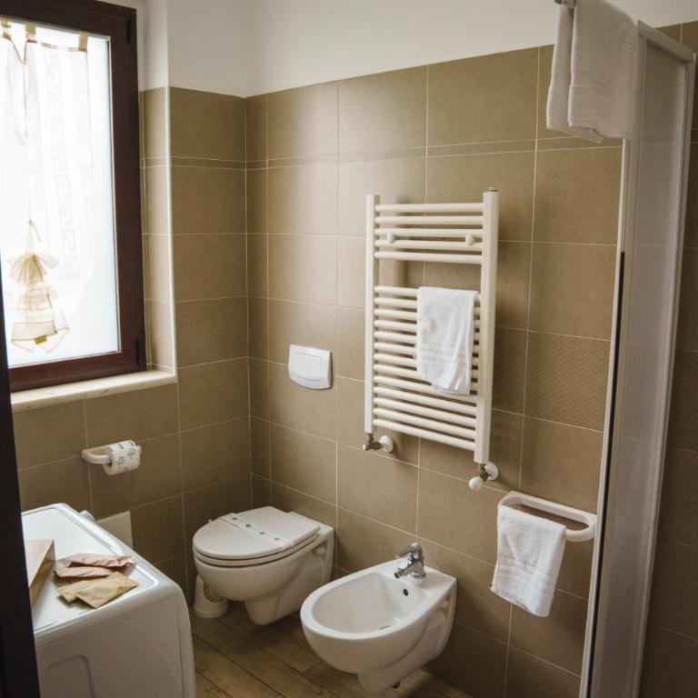 EIGHTEEN KT GOLDEN APARTMENT - With garden and private parking just 5 minutes walk from the historic center - Two-Bedroom Apartment - 28