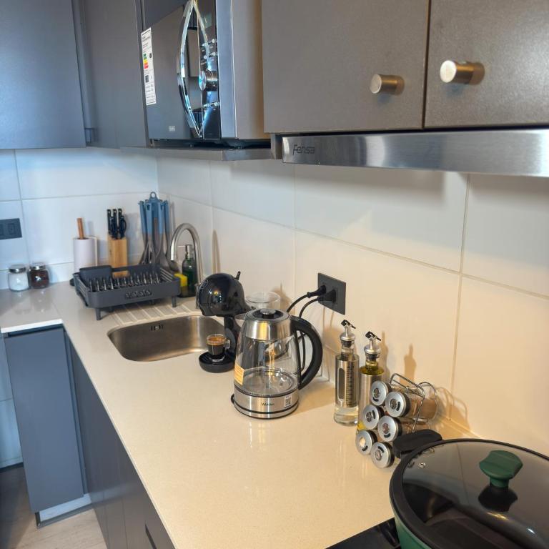 Depto moderno cerca del Estadio Nacional con Check in digital y Parking - Two-Bedroom Apartment - 12