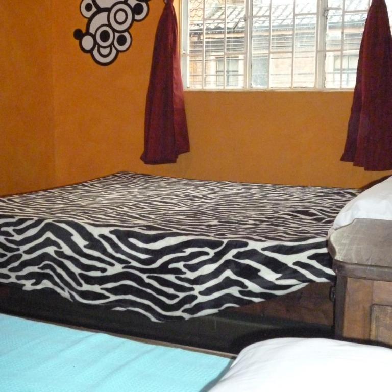 Hostal CQ Chapinero - Habitación Cuádruple con baño compartido - 6