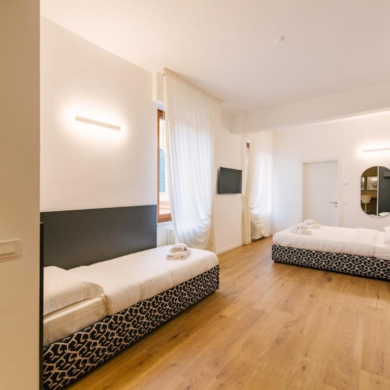 Leoni Suites - Camera Tripla Comfort - 2