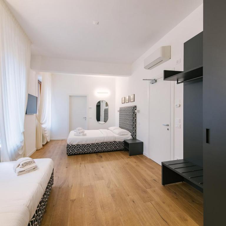 Leoni Suites - Camera Tripla Comfort - 3