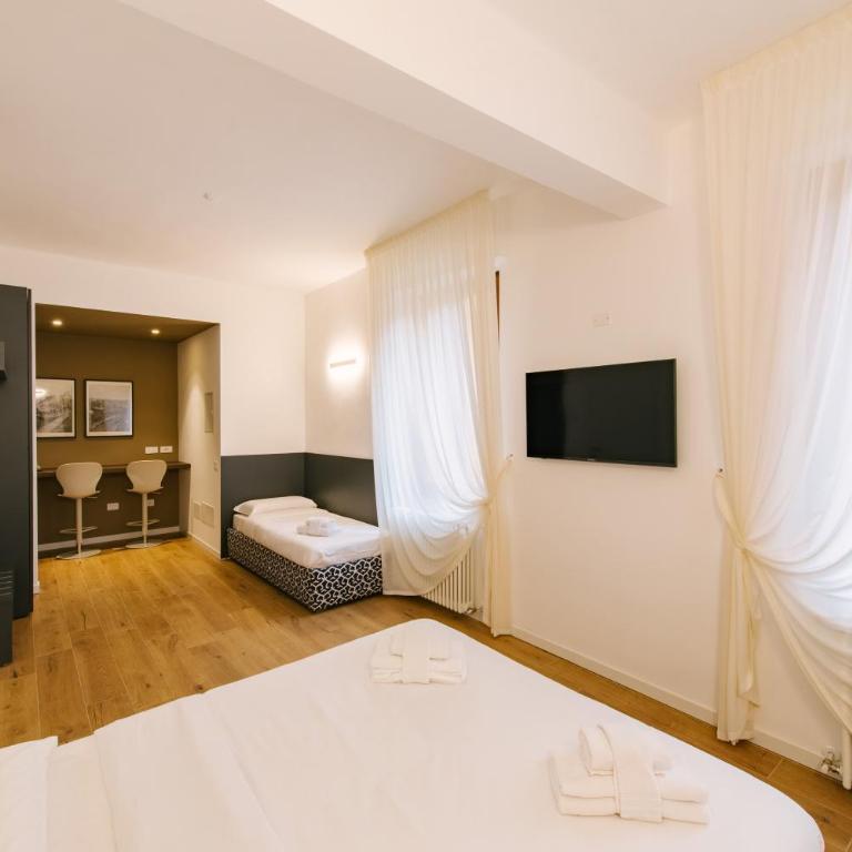 Leoni Suites - Camera Tripla Comfort - 6