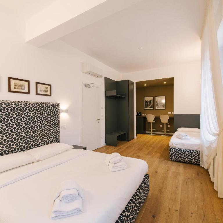 Leoni Suites - Camera Tripla Comfort - 1