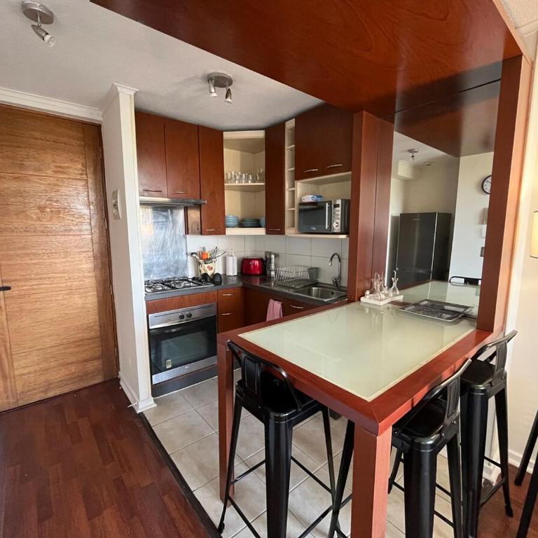 View of Santa Lucia, pool and Lastarria Connection - One-Bedroom Apartment - 12