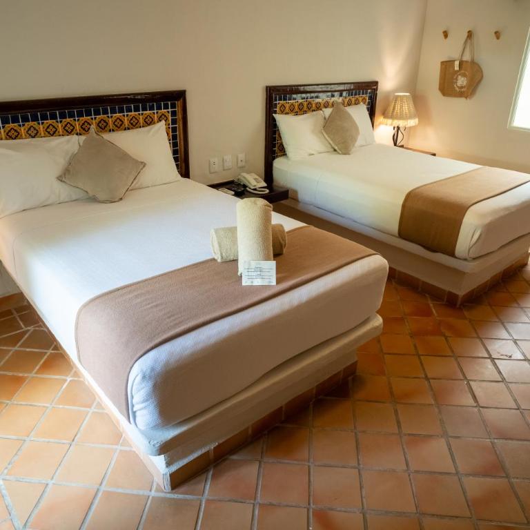 Petit Lafitte Beach Front Hotel & Bungalows - Classic Room - 2 Double Beds - 2