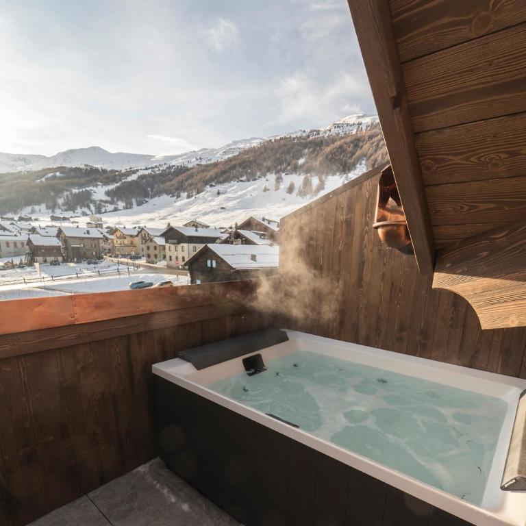 Mont Chalet Nevada - Hotel & Spa - Suite Deluxe con Vasca Idromassaggio - 11