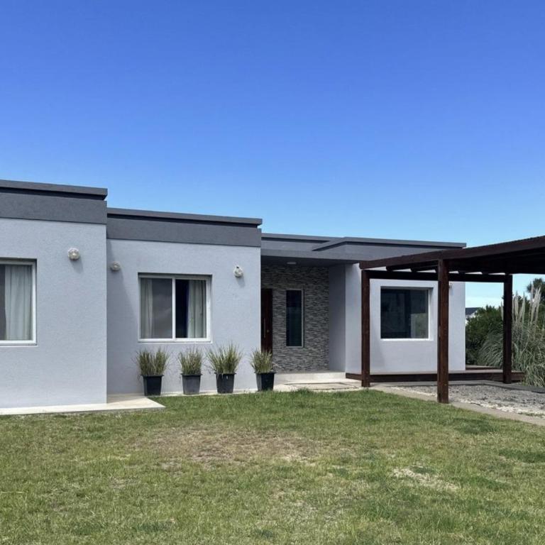 Casa familiar en Costa Esmeralda Barrio Deportivo - Villa de 3 dormitorios - 1