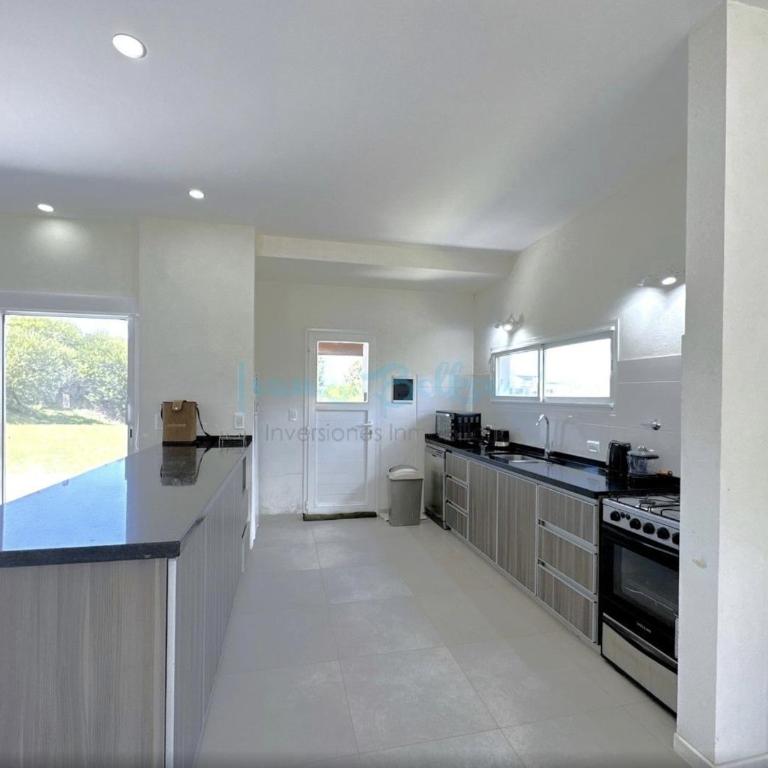 Casa familiar en Costa Esmeralda Barrio Deportivo - Villa de 3 dormitorios - 5