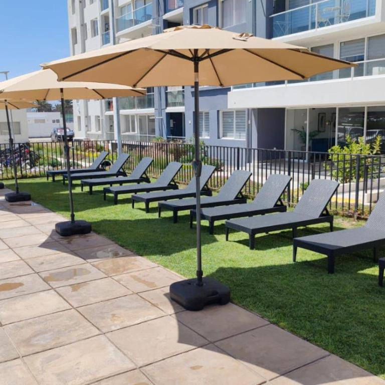 Bello departamento familiar nuevo en La Serena vista al mar, piso 4 con ascensor, malla de seguridad anticaída, piscina, estacionamiento gratuito, regalo de bienvenida, a pasos del Faro - Two-Bedroom Apartment - 3