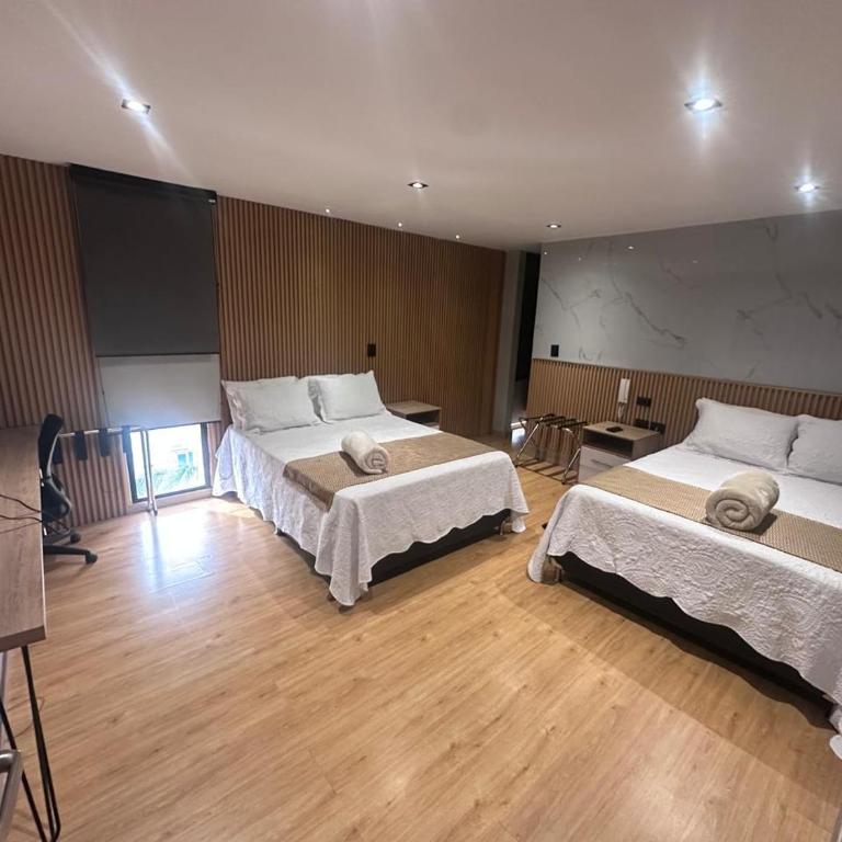 Hotel Gran Avenida - Habitación Doble Deluxe - 2 camas dobles - 1