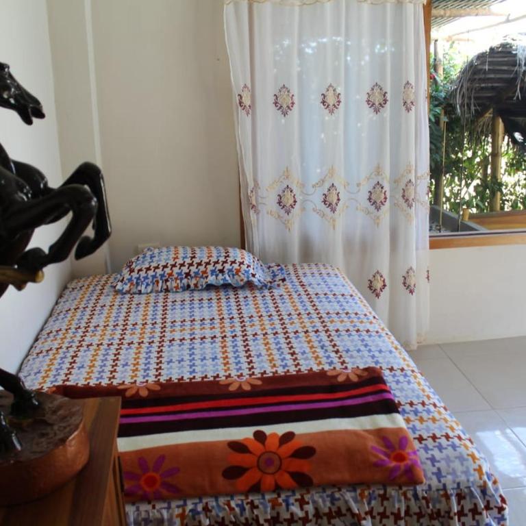 HostalManabiPuertolopezCascol - Classic Quadruple Room - 2